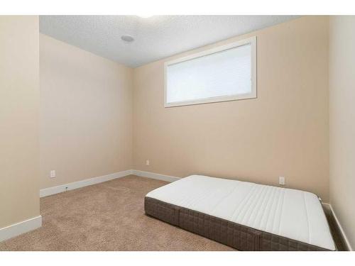 2422 Bowness Road Nw, Calgary, AB - Indoor Photo Showing Bedroom