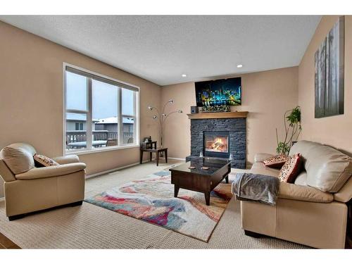 107 Everoak Green Sw, Calgary, AB - Indoor Photo Showing Living Room With Fireplace