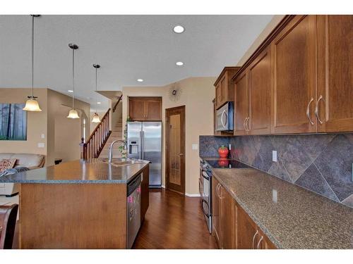 107 Everoak Green Sw, Calgary, AB - Indoor Photo Showing Kitchen With Double Sink