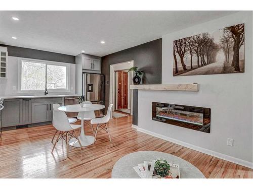 363 Ashley Crescent Se, Calgary, AB - Indoor With Fireplace