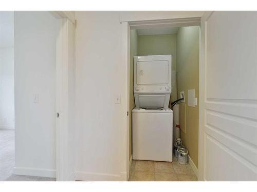 805-281 Cougar Ridge Drive Sw, Calgary, AB - Indoor Photo Showing Laundry Room