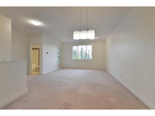 805-281 Cougar Ridge Drive Sw, Calgary, AB - Indoor Photo Showing Other Room