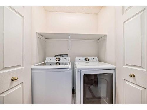 1011 Sierra Morena Park Sw, Calgary, AB - Indoor Photo Showing Laundry Room