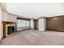 1011 Sierra Morena Park Sw, Calgary, AB  - Indoor With Fireplace 