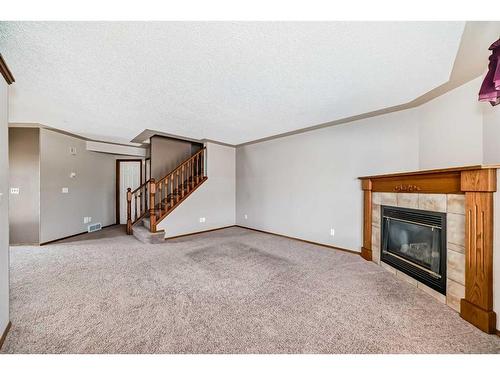 1011 Sierra Morena Park Sw, Calgary, AB - Indoor With Fireplace