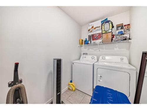 31 Creekside Grove Sw, Calgary, AB - Indoor Photo Showing Laundry Room