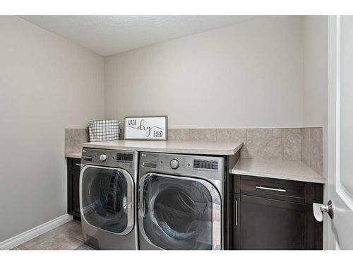 274 Wentworth Square Sw, Calgary, AB - Indoor Photo Showing Laundry Room