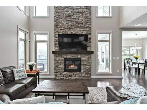 274 Wentworth Square Sw, Calgary, AB - Indoor Photo Showing Living Room With Fireplace