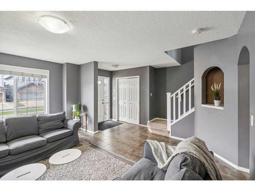 24 Taralake Street Ne, Calgary, AB - Indoor Photo Showing Living Room