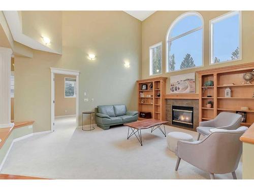 2 Canso Court Sw, Calgary, AB - Indoor With Fireplace