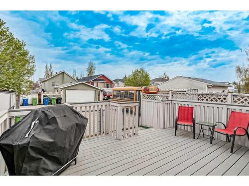 64 Chaparral Ridge Circle Se, Calgary, AB - Outdoor With Deck Patio Veranda With Exterior