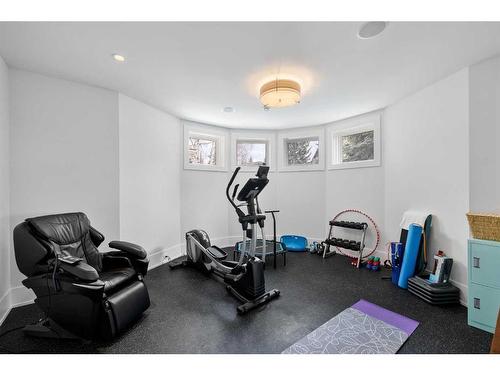 1122 Valois Avenue Sw, Calgary, AB - Indoor Photo Showing Gym Room