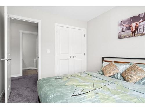 79 Birch Glen, Okotoks, AB - Indoor Photo Showing Bedroom