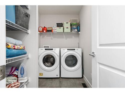79 Birch Glen, Okotoks, AB - Indoor Photo Showing Laundry Room