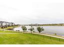 603 Country Village Cape Ne, Calgary, AB  - Outdoor With Body Of Water With View 