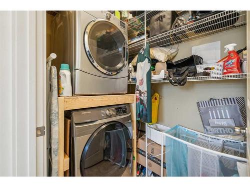 1203-281 Cougar Ridge Drive Sw, Calgary, AB - Indoor Photo Showing Laundry Room