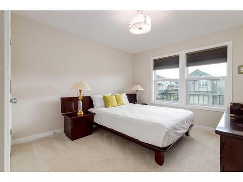 216 Cranarch Crescent Se, Calgary, AB - Indoor Photo Showing Bedroom