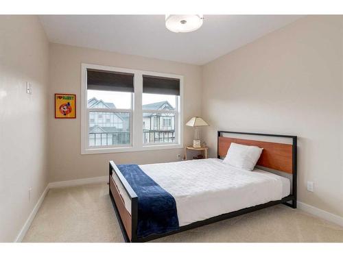 216 Cranarch Crescent Se, Calgary, AB - Indoor Photo Showing Bedroom