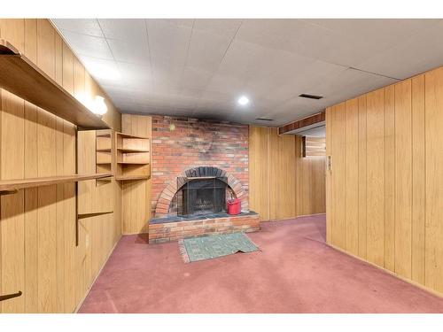 90 Lynnwood Drive Se, Calgary, AB - Indoor With Fireplace