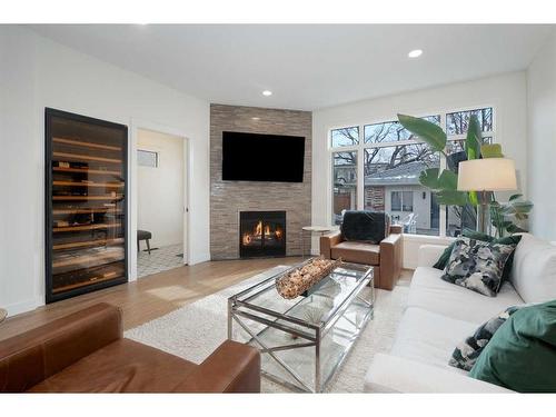 4210 18 Street Sw, Calgary, AB - Indoor Photo Showing Living Room With Fireplace