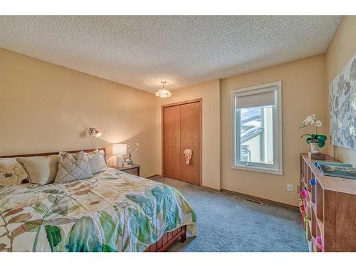 128 Edgeridge Place Nw, Calgary, AB - Indoor Photo Showing Bedroom