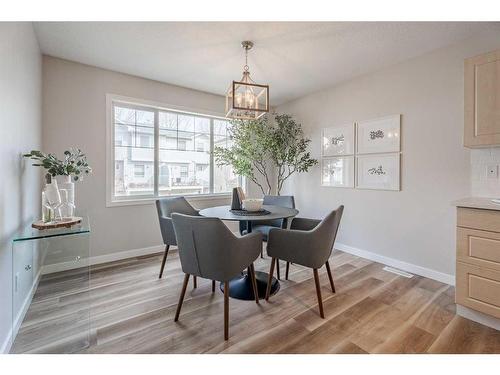 916-7038 16 Avenue Se, Calgary, AB - Indoor Photo Showing Dining Room