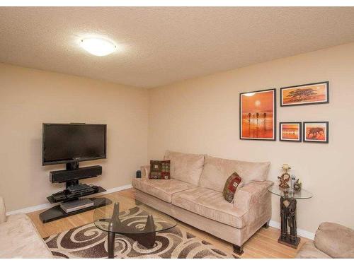 126 Silverado Plains Circle Sw, Calgary, AB - Indoor Photo Showing Living Room