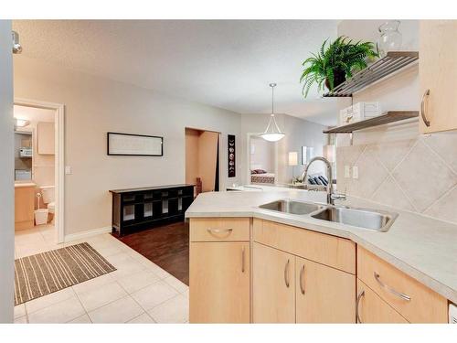 304-138 18 Avenue Se, Calgary, AB - Indoor Photo Showing Kitchen With Double Sink