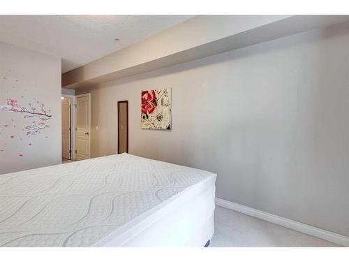 304-138 18 Avenue Se, Calgary, AB - Indoor Photo Showing Bedroom
