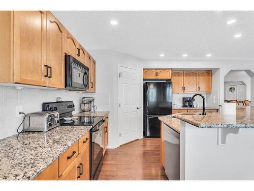 54 Chapalina Green Se, Calgary, AB - Indoor Photo Showing Kitchen With Upgraded Kitchen