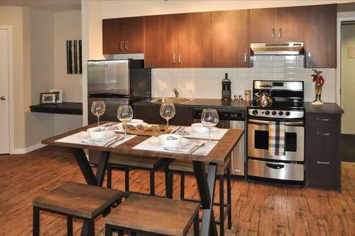 344 Banff Avenue, Banff, AB - Indoor Photo Showing Kitchen With Stainless Steel Kitchen