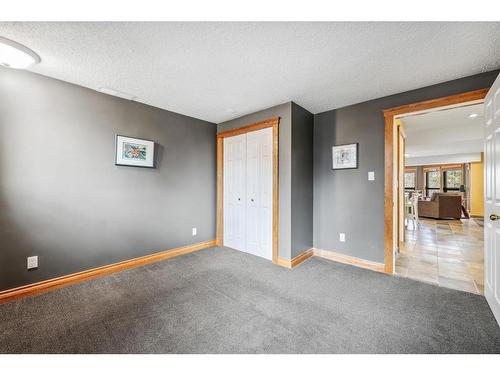216 Coach Light Bay Sw, Calgary, AB - Indoor Photo Showing Other Room