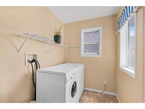138 Silverado Creek Crescent Sw, Calgary, AB - Indoor Photo Showing Laundry Room