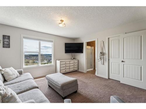 129 Heritage Hill, Cochrane, AB - Indoor Photo Showing Other Room