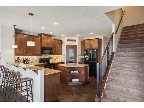 129 Heritage Hill, Cochrane, AB - Indoor Photo Showing Kitchen With Upgraded Kitchen
