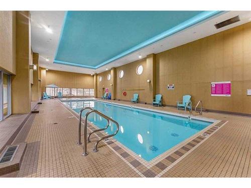 1504-55 Spruce Place Sw, Calgary, AB - Indoor Photo Showing Other Room With In Ground Pool
