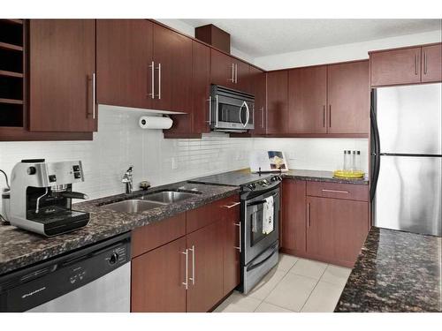 1504-55 Spruce Place Sw, Calgary, AB - Indoor Photo Showing Kitchen With Double Sink With Upgraded Kitchen