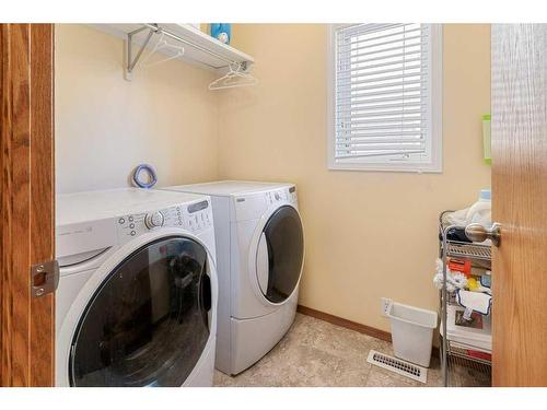 338 Mt Cornwall Circle Se, Calgary, AB - Indoor Photo Showing Laundry Room