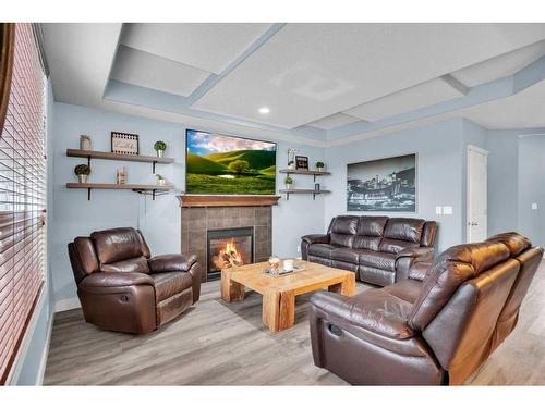 367 Prestwick Close Se, Calgary, AB - Indoor Photo Showing Living Room With Fireplace