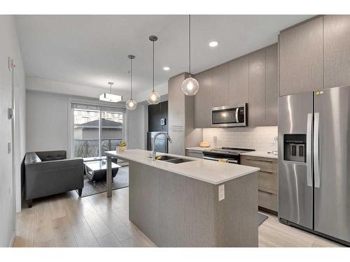 1130-76 Cornerstone Passage Ne, Calgary, AB - Indoor Photo Showing Kitchen With Double Sink With Upgraded Kitchen