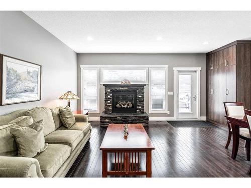 1414 26A Street Sw, Calgary, AB - Indoor Photo Showing Living Room With Fireplace