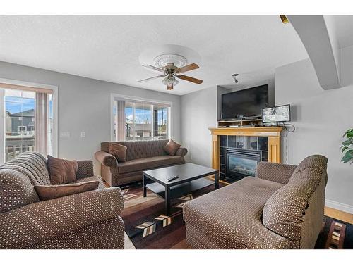 169 Tarawood Place Ne, Calgary, AB - Indoor Photo Showing Living Room With Fireplace