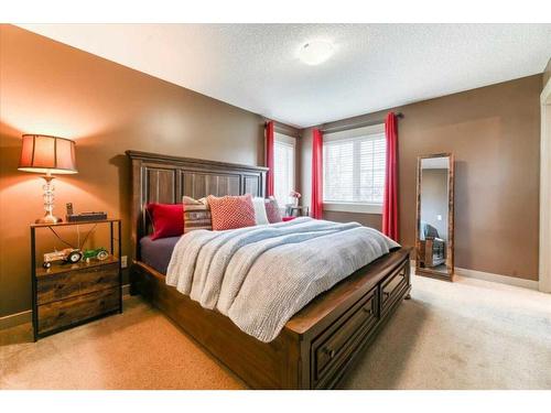 257 Rainbow Falls Manor, Chestermere, AB - Indoor Photo Showing Bedroom
