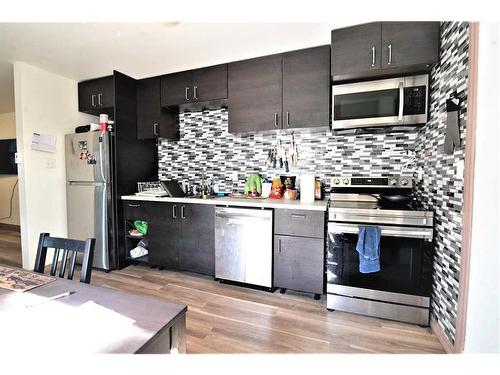 359 48 Avenue West, Claresholm, AB - Indoor Photo Showing Kitchen With Upgraded Kitchen