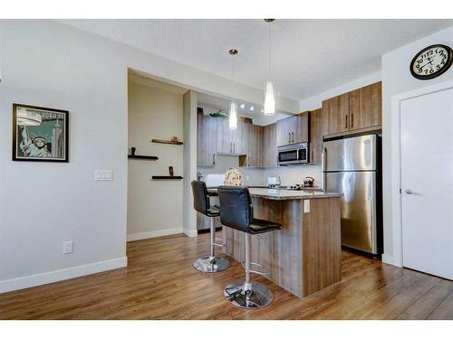 111-8 Sage Hill Terrace Nw, Calgary, AB - Indoor Photo Showing Kitchen With Stainless Steel Kitchen With Upgraded Kitchen