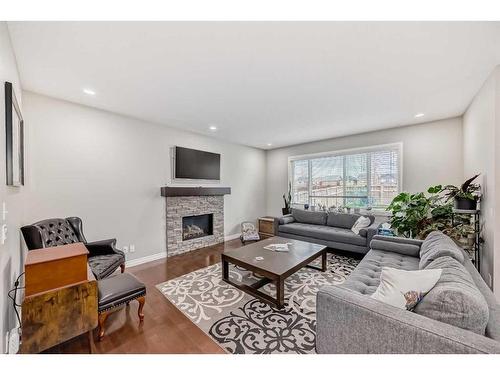 134 Mahogany Passage Se, Calgary, AB - Indoor Photo Showing Living Room With Fireplace