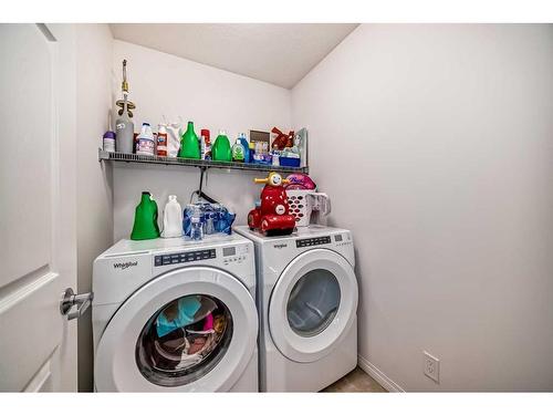 133 Cityside Common Ne, Calgary, AB - Indoor Photo Showing Laundry Room