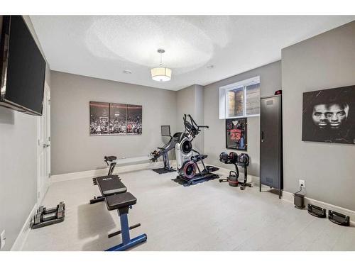 22 Crestridge Mews Sw, Calgary, AB - Indoor Photo Showing Gym Room