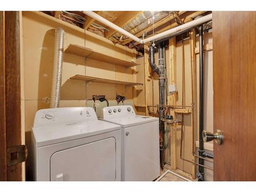 64 Woodview Court Sw, Calgary, AB - Indoor Photo Showing Laundry Room