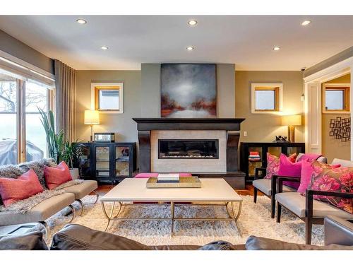 3822 11 Street Sw, Calgary, AB - Indoor Photo Showing Living Room With Fireplace